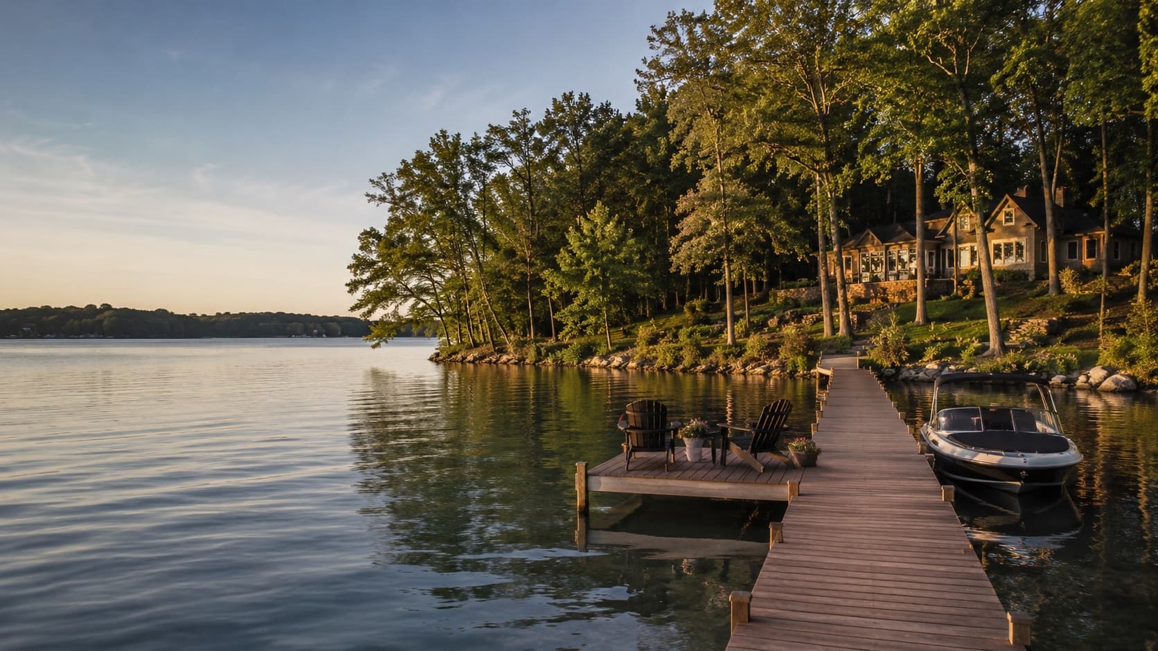 A private dock reaching into a calm, wooded bay on Lake Minnetonka at golden hour